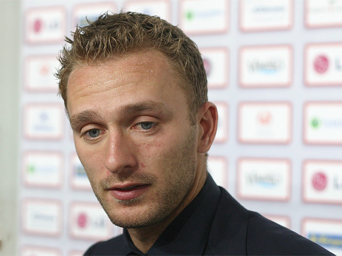 What is the name of the football player?