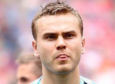 Hva er navnet på denne fotballspilleren?