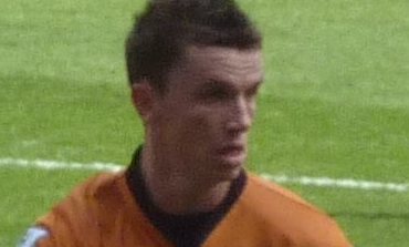 Hva er navnet på denne fotballspilleren?