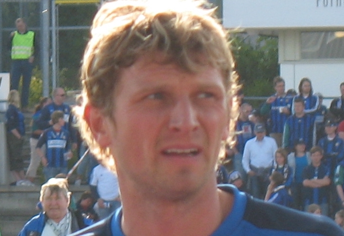 What is the name of the football player?